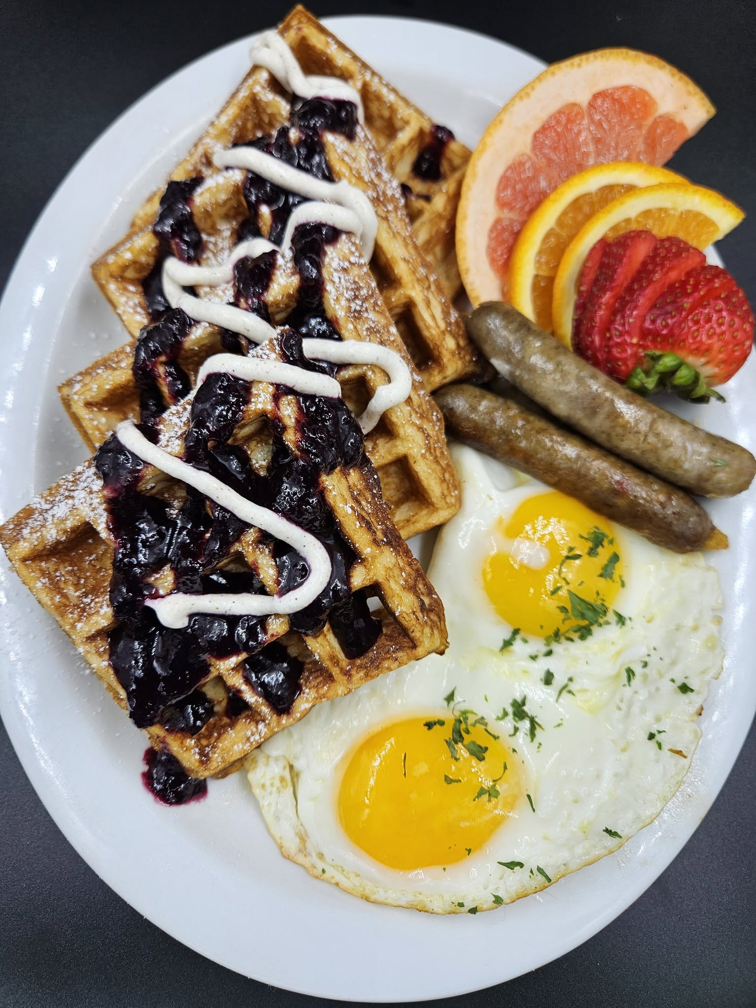 A platter of freshly made cornmeal waffles.