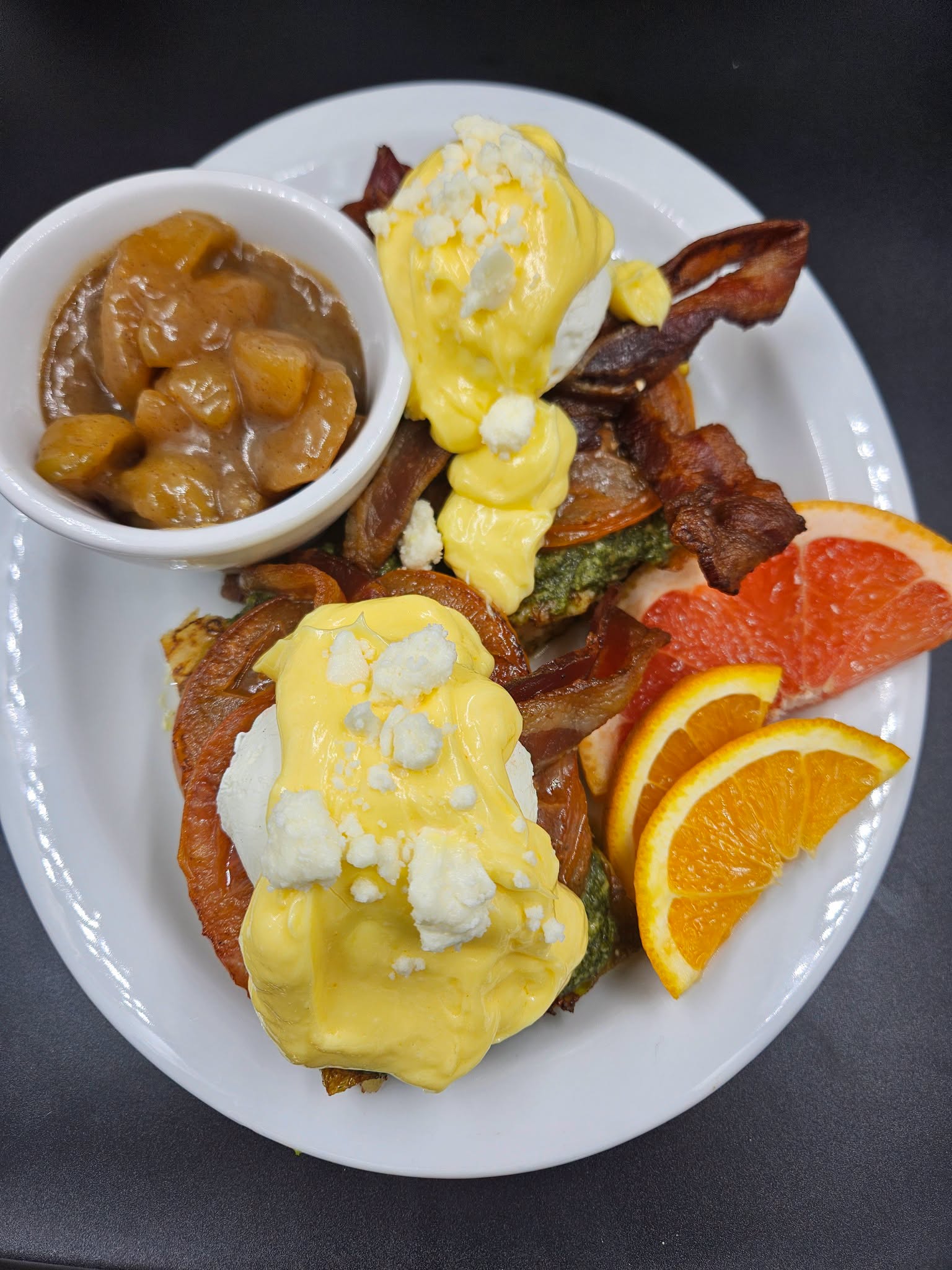 A delicious plate of Model City Eggs Benedict from Momma D's