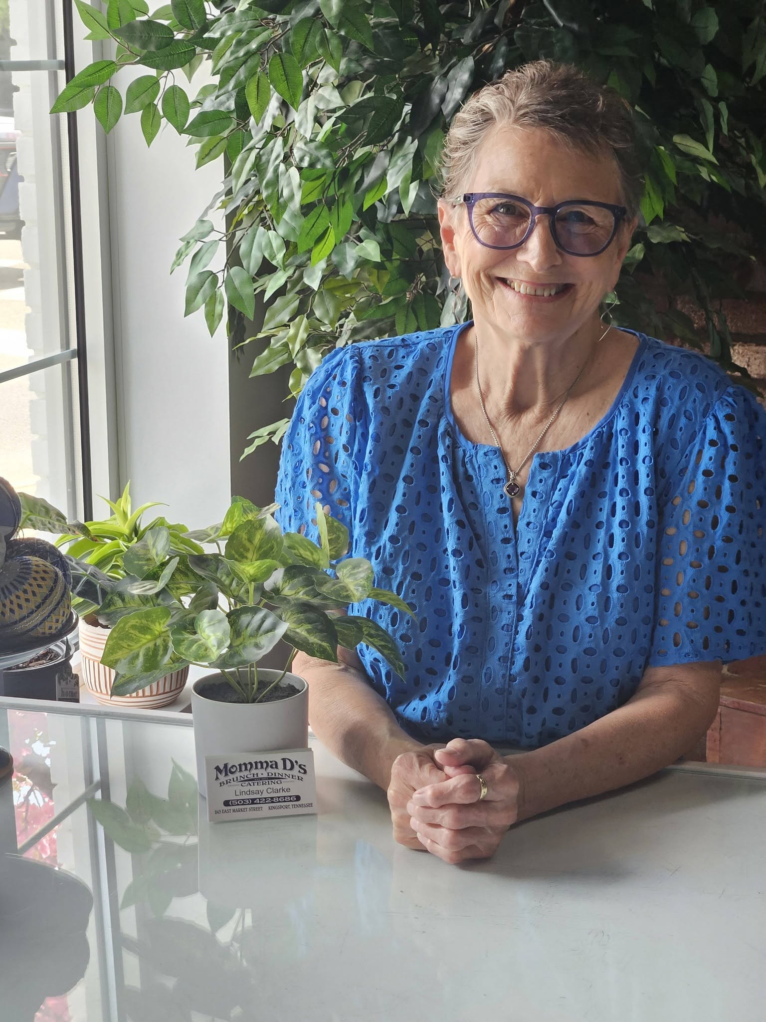 A portrait of Momma D, the restaurant owner.